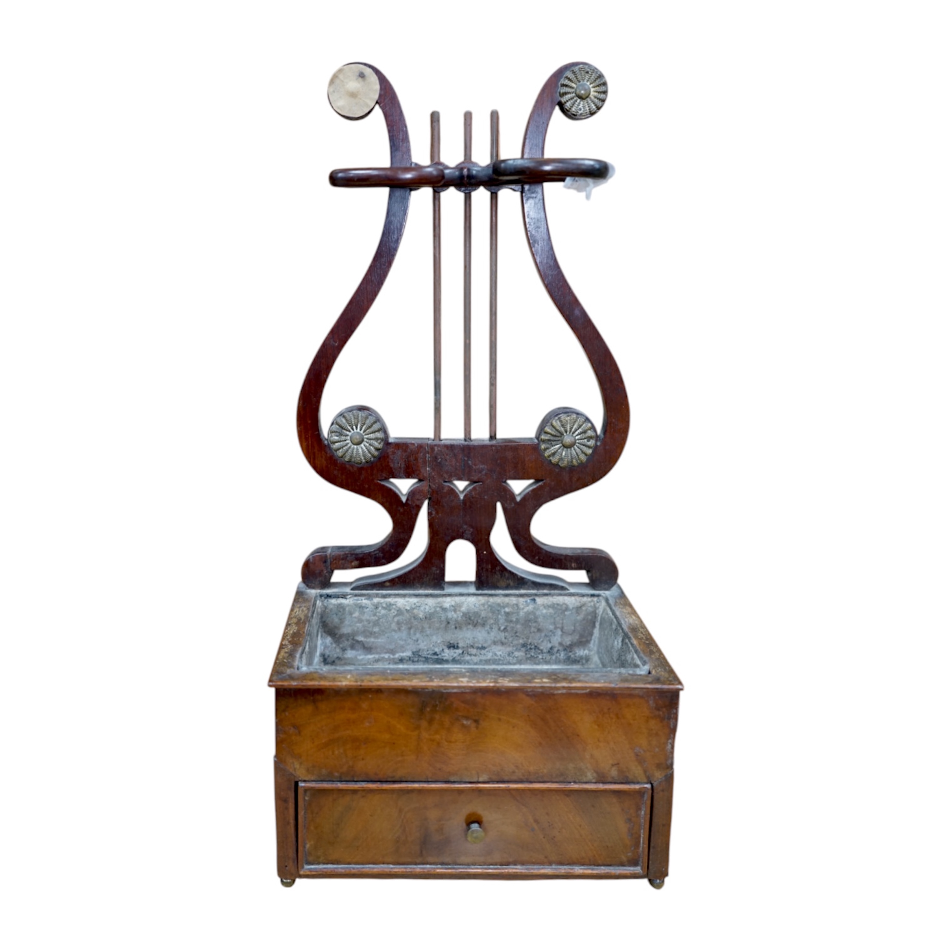 A rare Regency mahogany clay pipe stand, the lyre shaped back over a tobacco draw, 45cm tall. Condition - poor